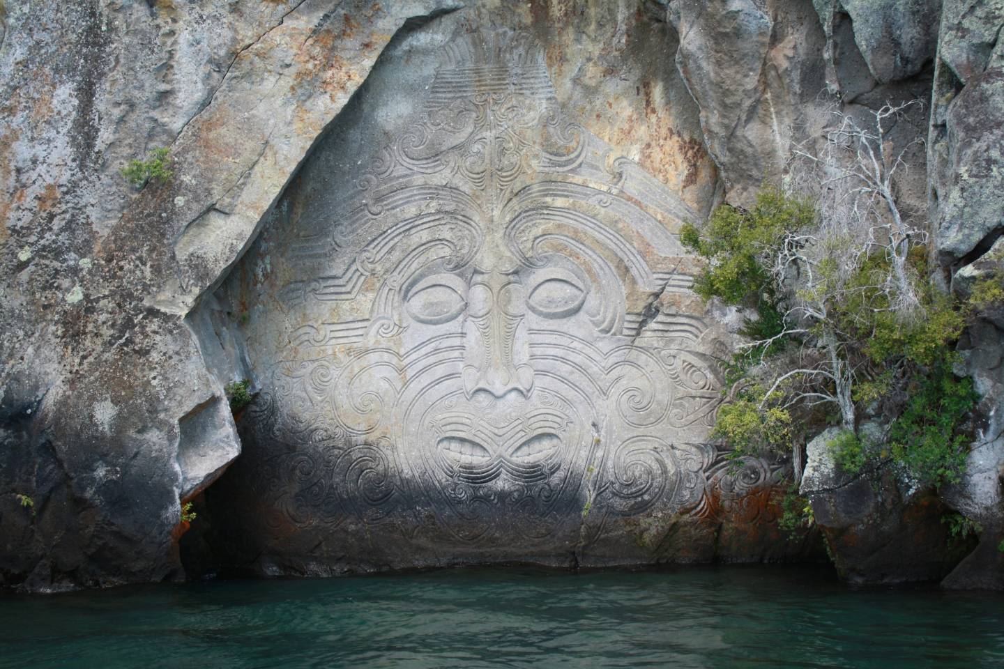 Maori rock carving